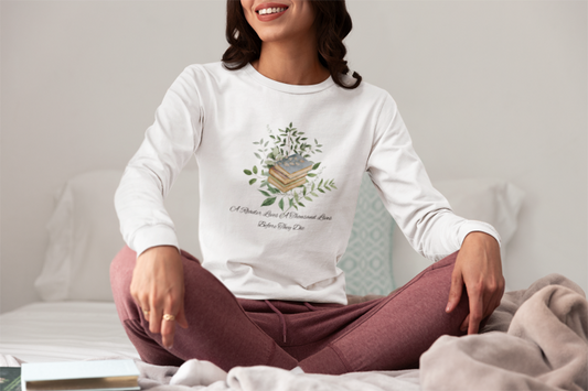 "A Reader lives a thousand lifetimes." Unisex Ultra Cotton Long Sleeve Tee